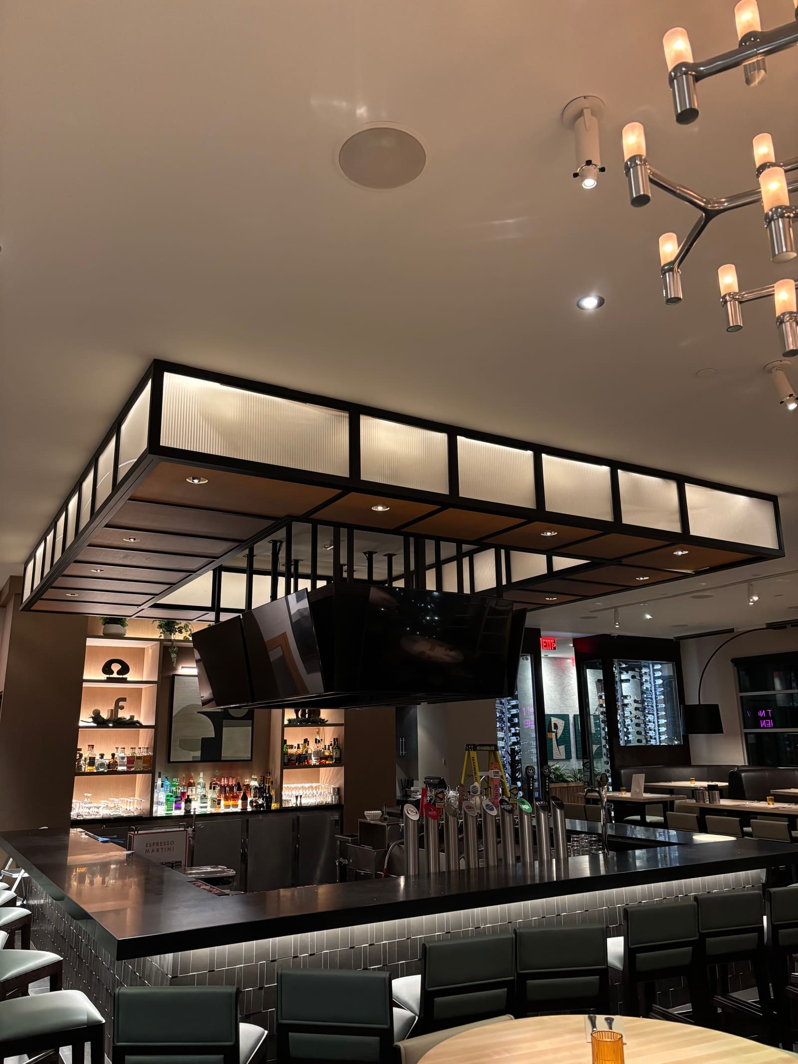 Decorative pendant lighting installation in a restaurant